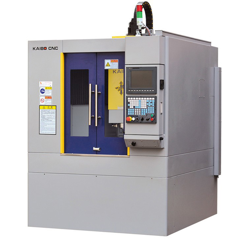 Multi-axis CNC milling machine performing precise graphite surface machining