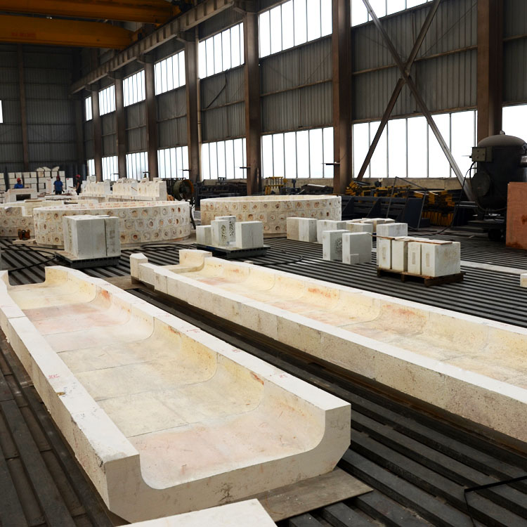 Close-up view of a ceramic roller kiln with precisely cut insulating firebricks showing minimal joint gaps.