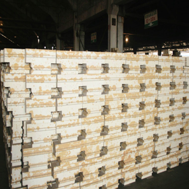 Silicon bricks installation in hot blast furnace showing precise cutting and assembly