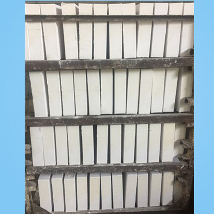 Industrial glass furnace with lining of premium silica bricks maintaining shape at high temperatures