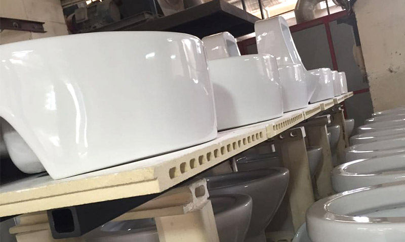 High-density, low-porosity silica bricks in a coke oven