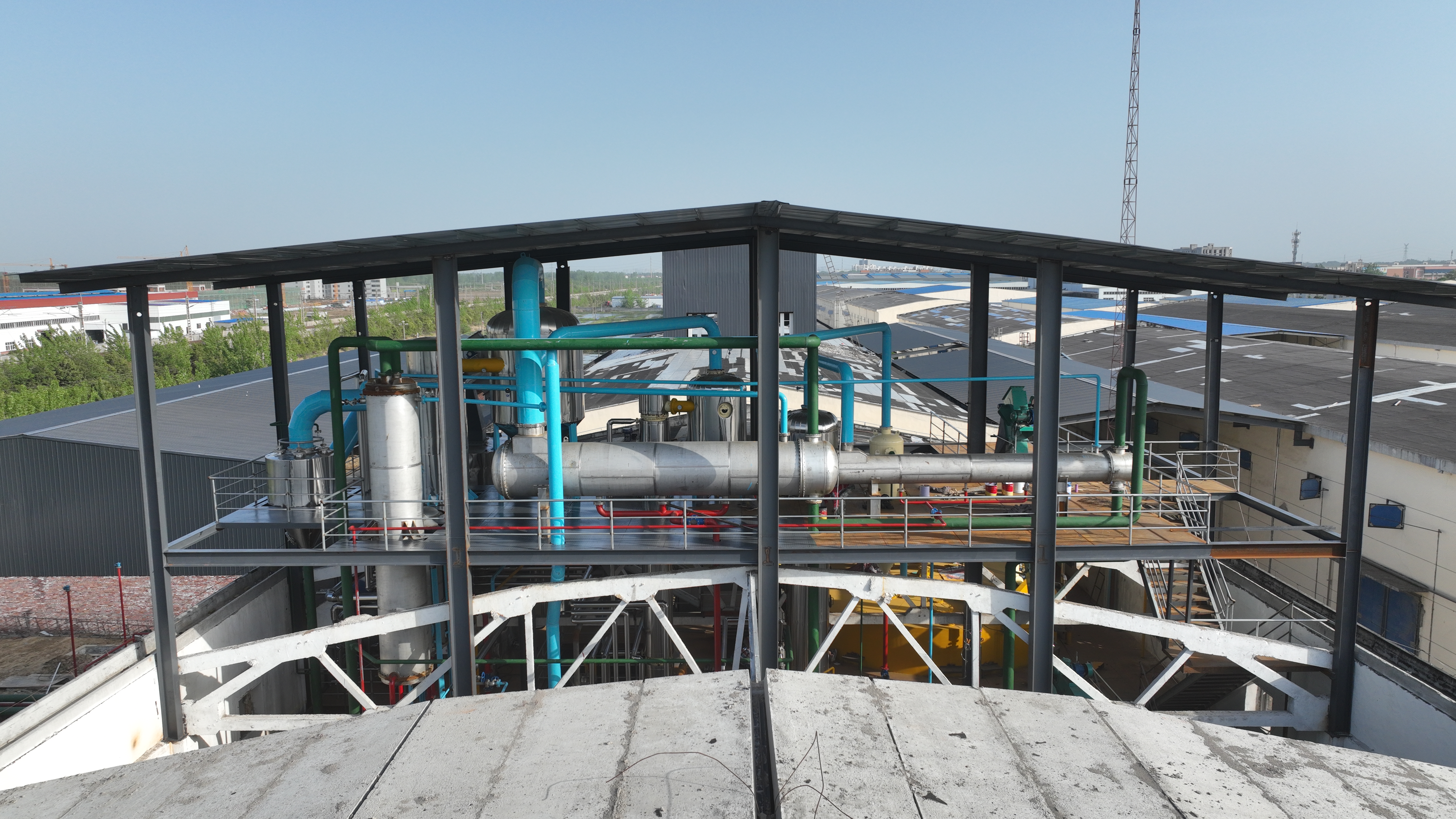 Maintenance process of small sunflower seed oil press showing cleaning and lubrication