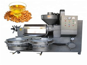 A worker operating a soybean oil manufacturing machine