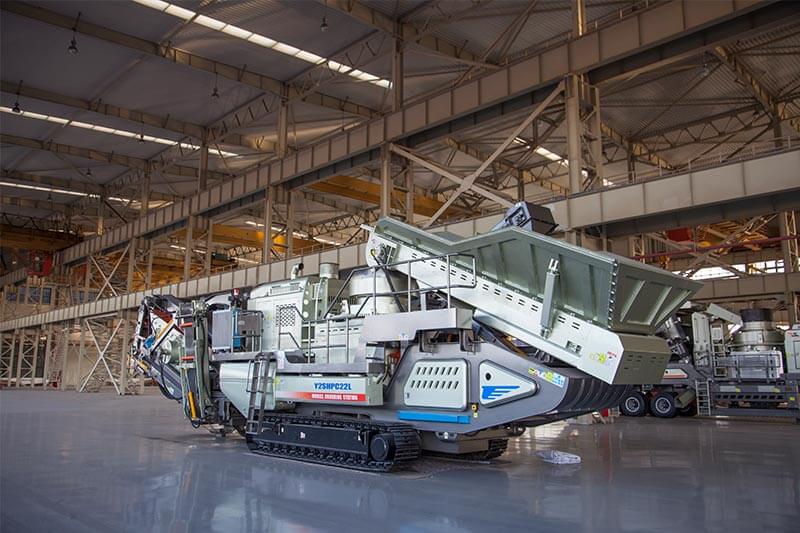 Dual-lip labyrinth seal design installed on an impact crusher rotor housing, showing improved protection against dust ingress in harsh mining conditions.