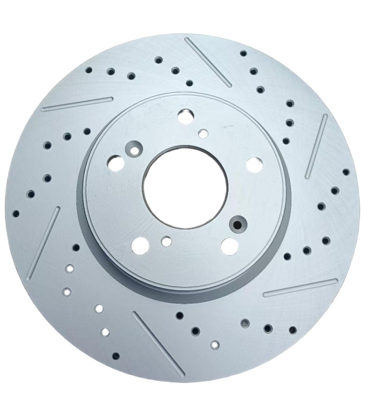 Team of engineers reviewing IATF TS16949 compliance documents in a modern quality lab