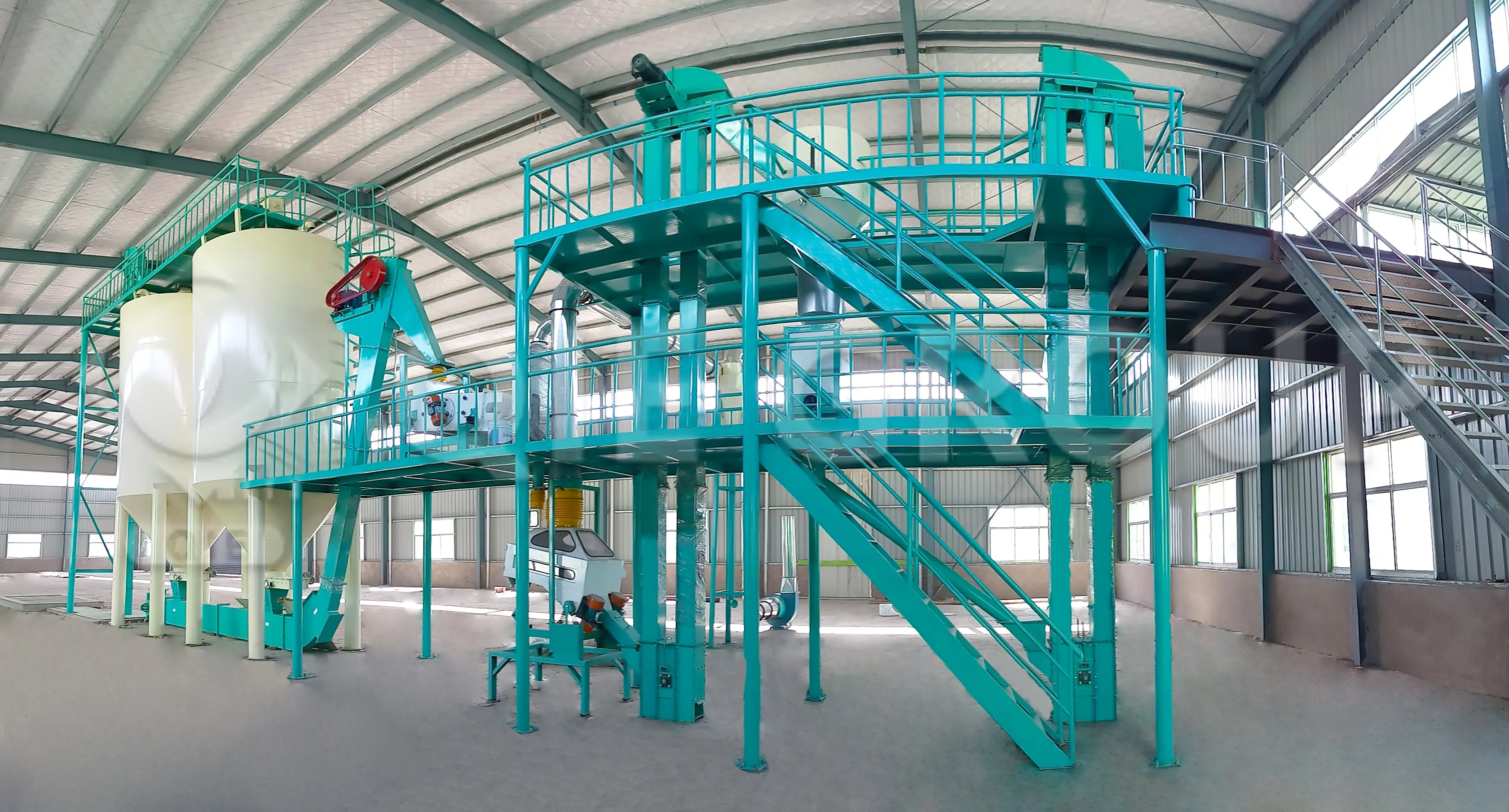 Oilseed processing equipment including cleaning, softening, and flaking machines