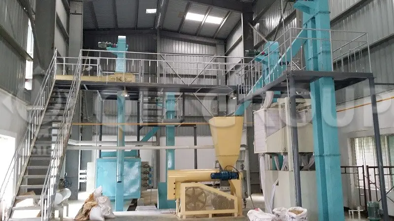 Rice bran pretreatment plant, showing the equipment for stabilization and preparation for oil extraction.