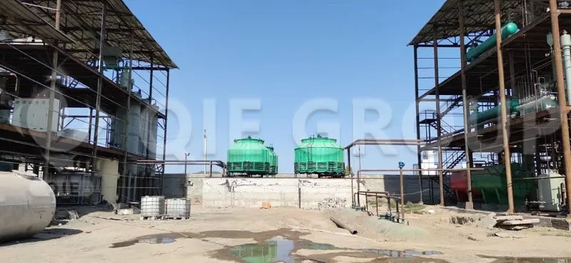 An oilseed processing plant under construction, including pressing, extraction, and refining workshops.