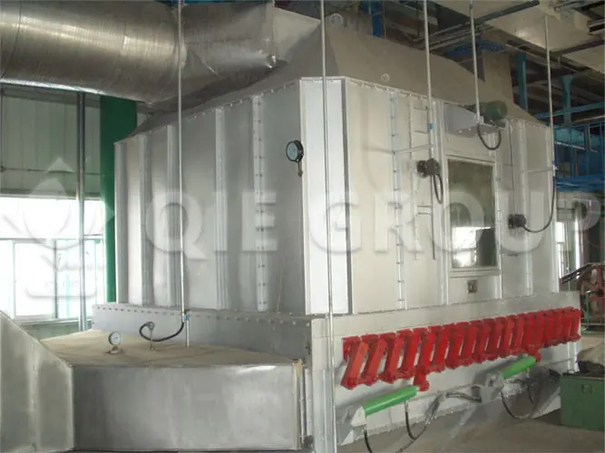 Counterflow drying and cooling machine for soybeans used to control moisture before solvent extraction