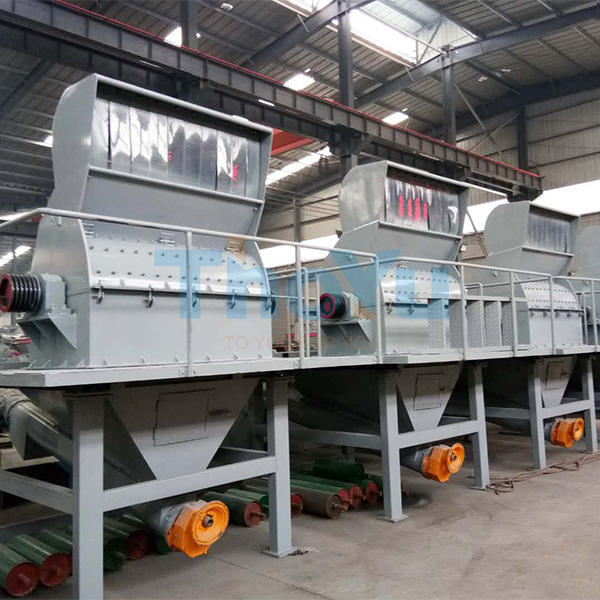 Maintenance personnel checking the wood crusher