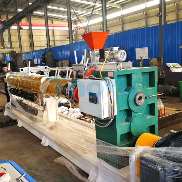 Plastic pallet molding machine in operation