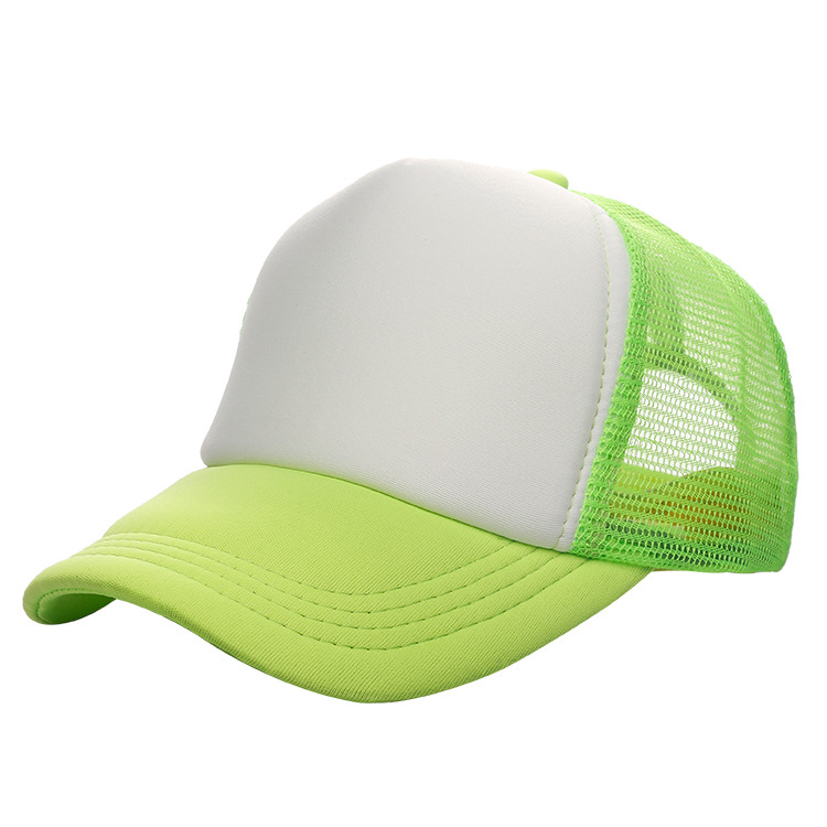 A child smiling while wearing a wheatgrass sun hat at a beach picnic, showing off the adjustable strap and breathable fabric.