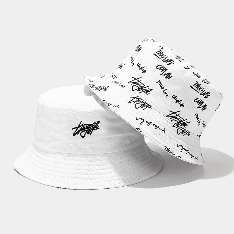 Close-up of a cotton bucket hat with a logo printed using screen printing, highlighting texture and clarity.