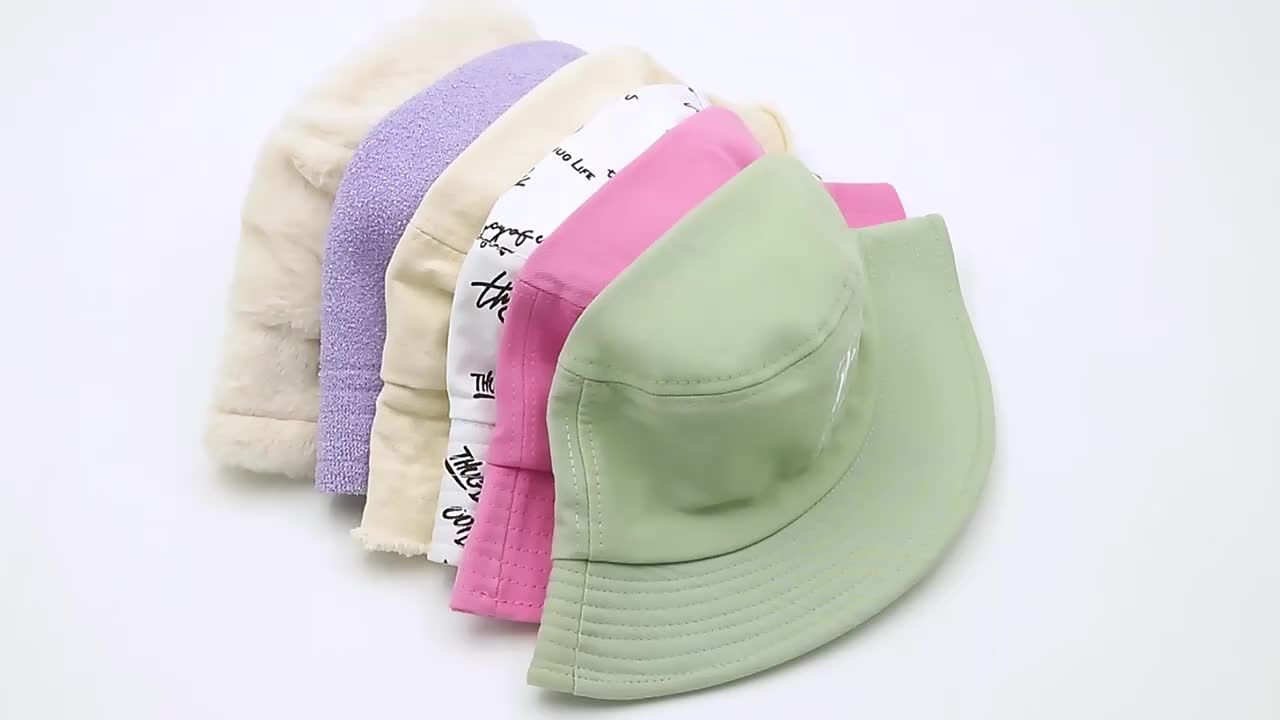 Reversible cotton bucket hats showcasing two distinct color options side by side