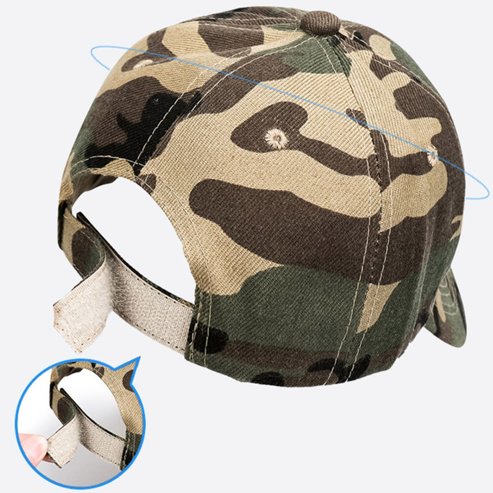 A smiling child wearing an adjustable wheatgrass sun hat at the beach, with sunlight filtering through the brim.