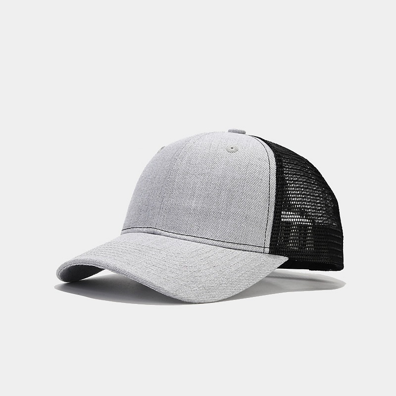 A child adjusting the size of a wheatgrass sun protection boat hat