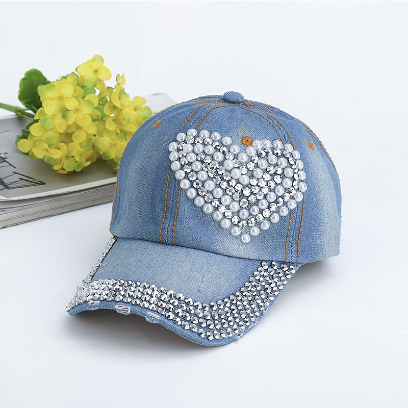 Children smiling while wearing wheatgrass sun protection boat hats