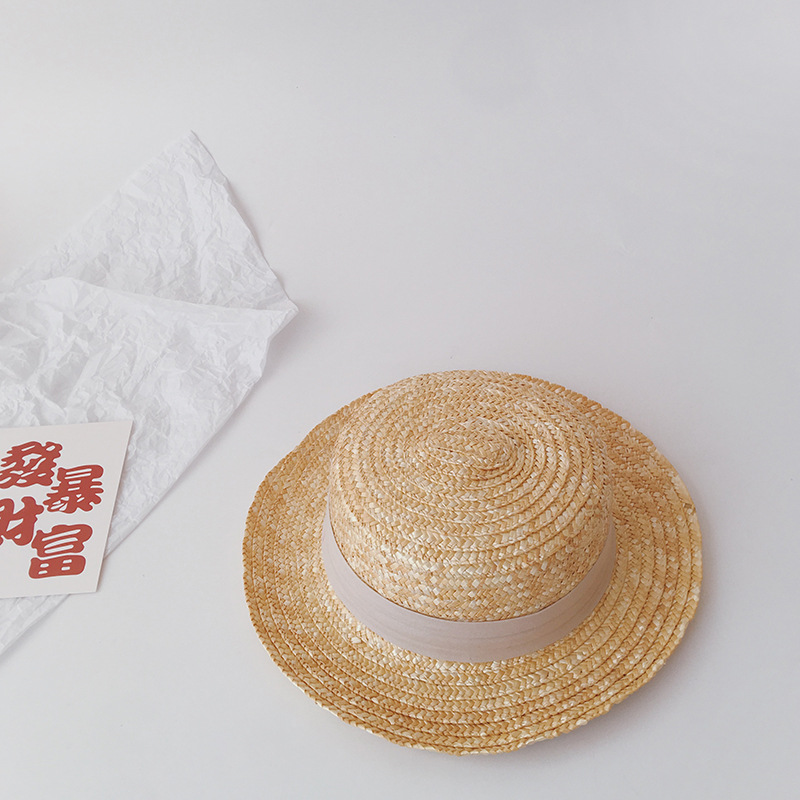 Happy children playing outdoors wearing colorful customized sunscreen hats